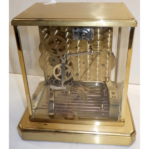 140 - A skeleton mantel clock in a brass case with perspex glazing, the German Shatz 7 jewel movement stri... 