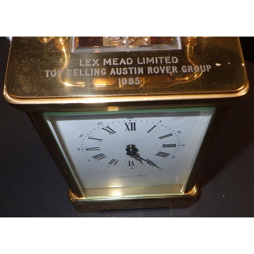 142 - A Mappin & Webb brass cased carriage clock,  presentation engraving to top plate. 13cm tall