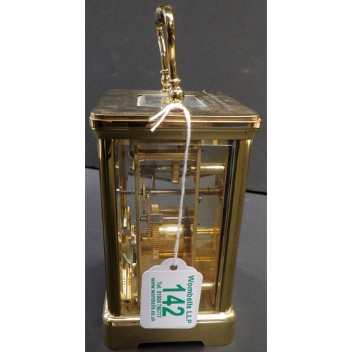 142 - A Mappin & Webb brass cased carriage clock,  presentation engraving to top plate. 13cm tall