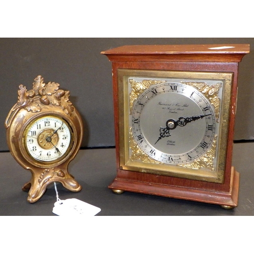 145 - An Elliott mantel clock, the dial signed Garrard & Co Ltd, and an Ansonia desk clock in an ormolu ca... 