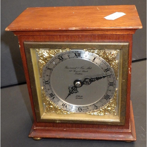 145 - An Elliott mantel clock, the dial signed Garrard & Co Ltd, and an Ansonia desk clock in an ormolu ca... 