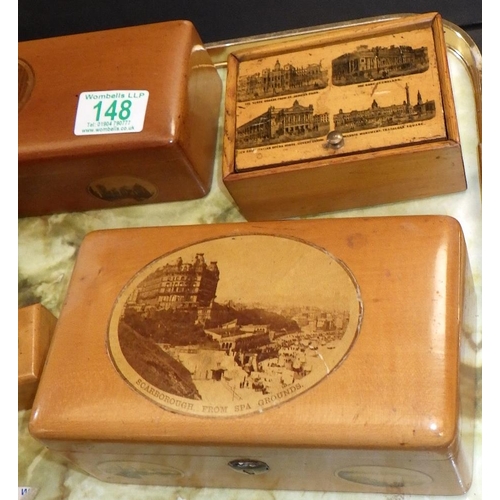 148 - Mauchline Ware: a velvet lined glove box, a silk lined casket, other boxes etc.