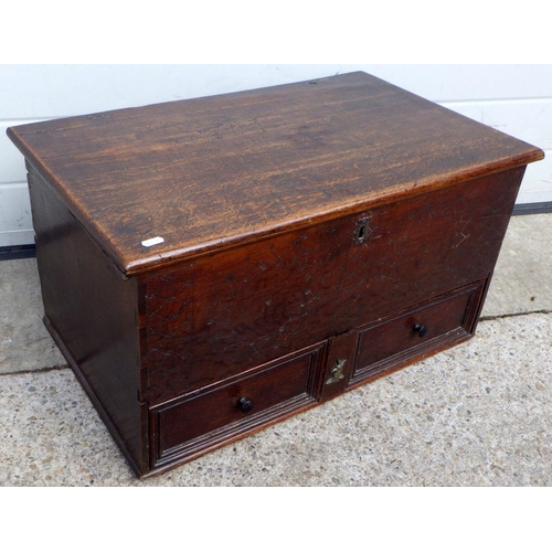 901 - A small oak blanket box with lower drawer, 69cm wide