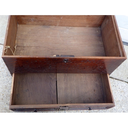 901 - A small oak blanket box with lower drawer, 69cm wide