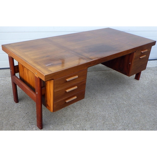 908 - A Sibast furniture hardwood desk, 200cm wide, together with an office swivel chair, (a/f)