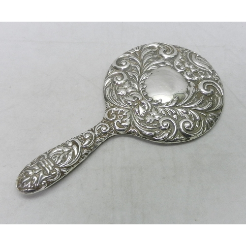 64 - A silver dressing set hand mirror in Edwardian manner, late 20th cent.