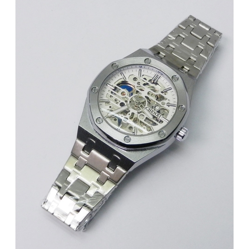 96 - A Chenxi automatic skeleton dial bracelet watch, stainless steel, 41mm across case; a stainless stee... 