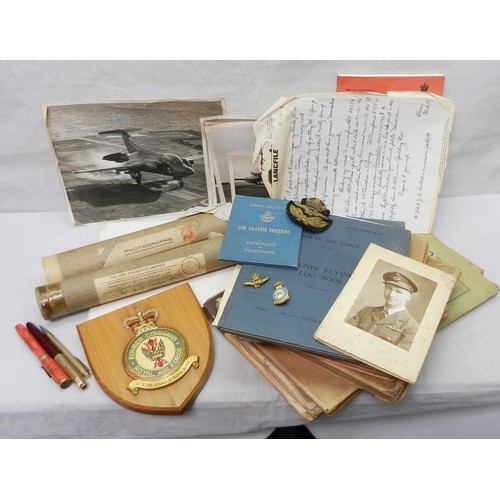 121 - A collection of five WW2 and Cold War RAF Pilots Log Books, Pilot's Notes booklet, photographs etc t... 