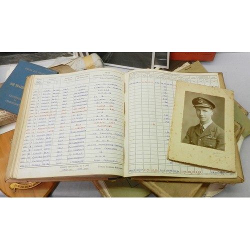 121 - A collection of five WW2 and Cold War RAF Pilots Log Books, Pilot's Notes booklet, photographs etc t... 