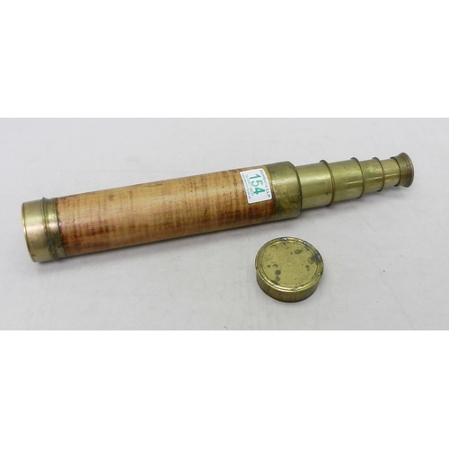 154 - A brass and mahogany telescope, unsigned.  A/F.  29.5cm closed