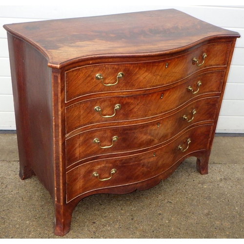 A mahogany and tulipwood banded serpentine fronted chest of drawers with internal brush board (warped), Edwardian drawer linings, 101cm wide