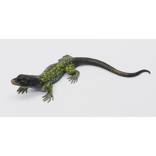 A lizard, cold painted bronze, manner of Bergman marked Geschutzt 3003 to base.  19cm long, ex Elvington Hall