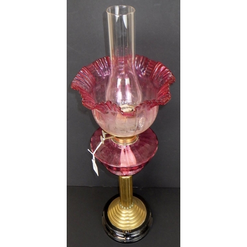 1 - A Victorian oil lamp with etched cherubs on shade 70cm tall to funnel