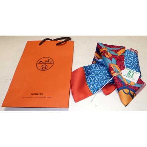 83 - A silk Hermes labelled scarf with bag