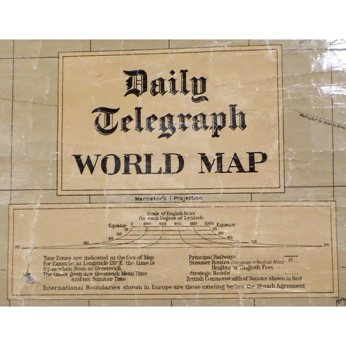 114 - A large vintage Daliy Telegraph World map 100 x 75cm