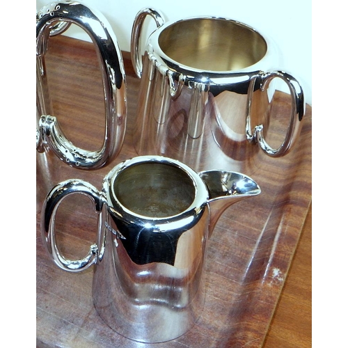 121 - A large scale Walker & Hall silver plated four piece tea / coffee set