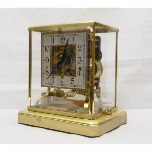 247 - A skeleton mantel clock in a brass case with perspex glazing, the German Shatz 7 jewel movement stri... 