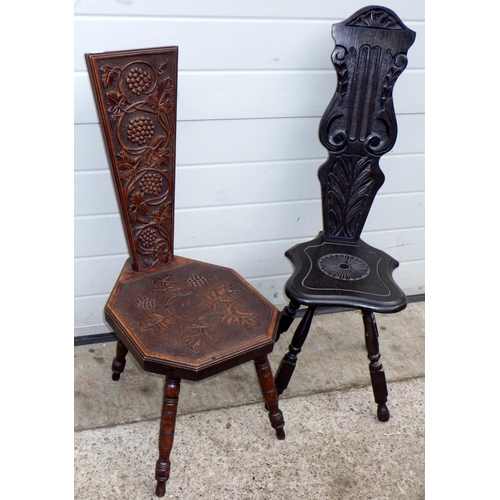 801 - A carved oak spinning chair carved with a grape vine and another (2)