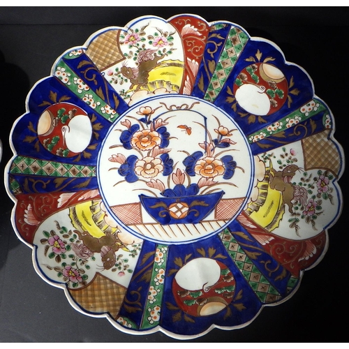 114 - Two Imari chargers 34cm diameter