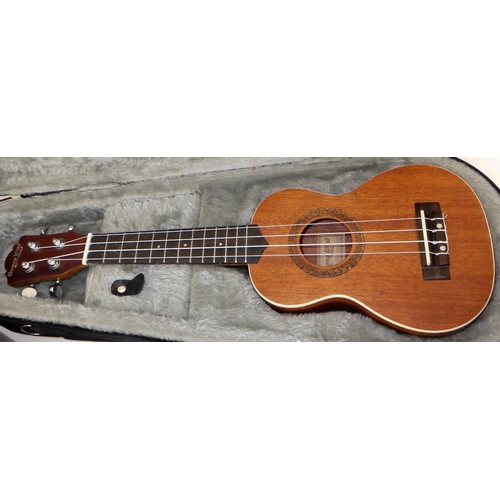 172 - A Suprano ukulele together with a Strong Wind ukulele both with accessories