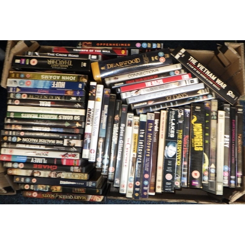 186 - Five boxes of DVDs (5)