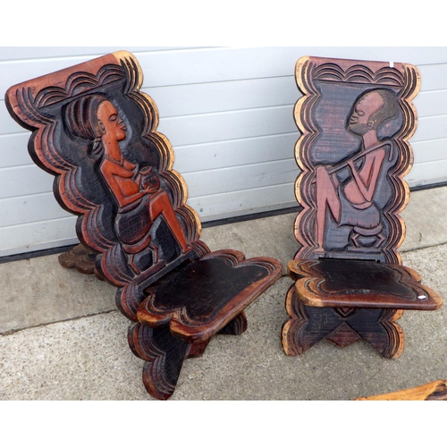 536 - Two African carved chairs and a coffee table (3)