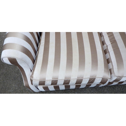 537 - A Duresta two seat settee, 140cm wide, with striped fabric, some marks