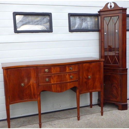 552 - A reproduction mahogany serpentine fronted sideboard, missing one ring together with a tall corner c... 