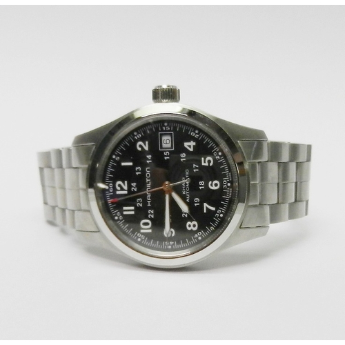 1 - A Hamilton Khaki Automatic bracelet watch, stainless steel with black dial and half glass display ba... 