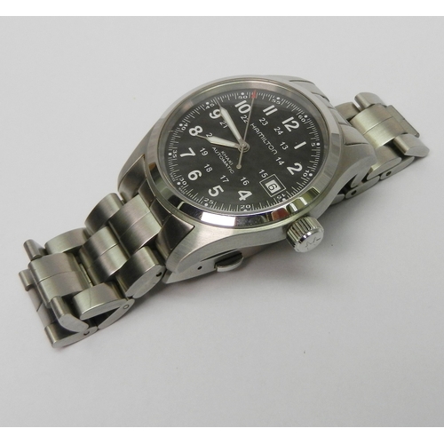 1 - A Hamilton Khaki Automatic bracelet watch, stainless steel with black dial and half glass display ba... 