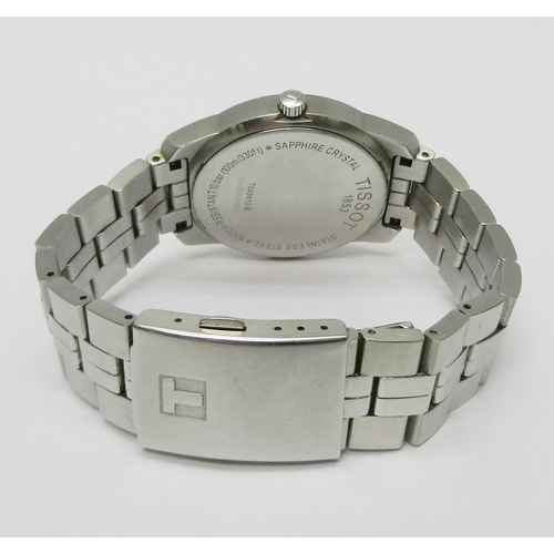 3 - A Tissot PR100 Quartz bracelet watch, stainless steel with a blue dial.  Boxed with papers and spare... 