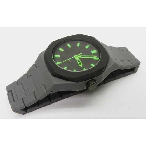 6 - A D1 Milano Neon polycarbon quartz bracelet watch.  40mm across case.  No box or papers or spare lin... 