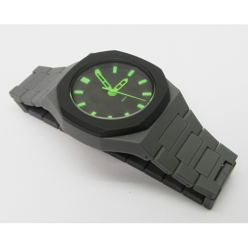 6 - A D1 Milano Neon polycarbon quartz bracelet watch.  40mm across case.  No box or papers or spare lin... 