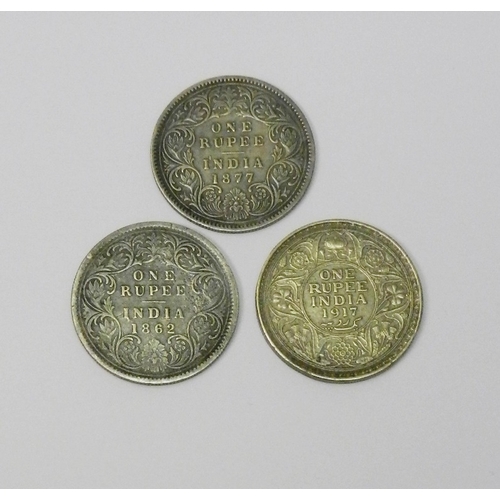 89 - Two Victoria One Rupee coins,1862 and 1877; a George V 1917 One Rupee coin.  (3)