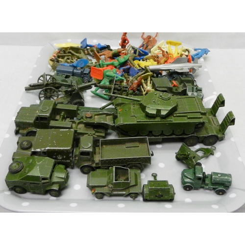 144 - Die-Cast Toys: a collection of military vehicles incl a Dinky Supertoys tank transporter with tank, ... 