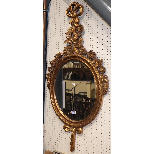 252 - A modern gilt framed bevelled mirror 120cm long