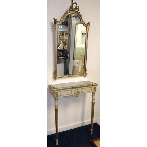 377 - A gilt wood console table with matching mirror