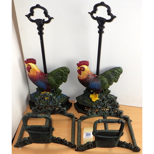 384 - Two cast chicken door stops together with two boot scrapers (4)