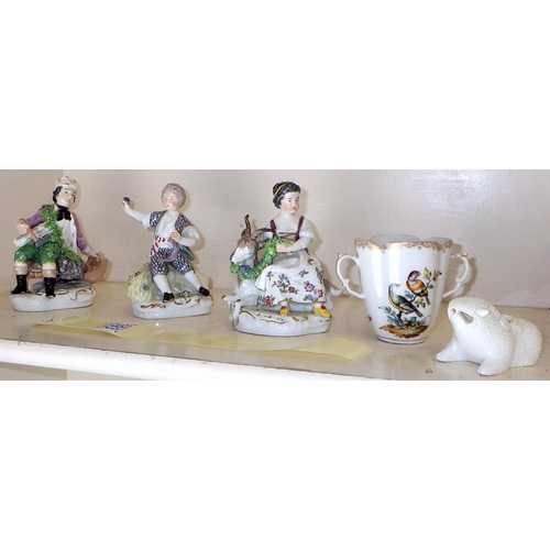 393 - Three Dresden porcelain figures together with a painted cup and a grotesque spoon warmer ? AF