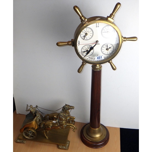 401 - A brass chariot and horses together with a modern clock in form of a ship's wheel (2)