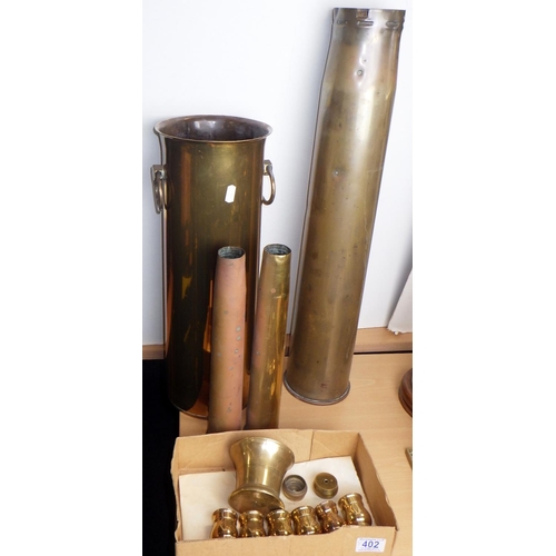 402 - A group of large and small trench art shells etc (5)