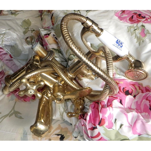 405 - A pair of floral curtains together with a traditional style brass bath tap (2)