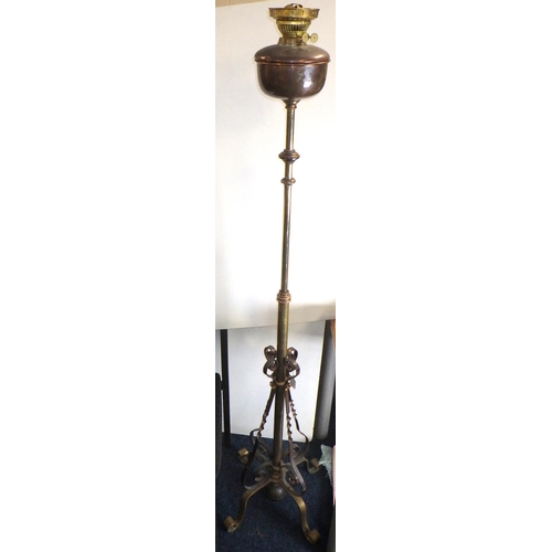 407 - An Arts and Crafts copper and brass adjustable standard oil lamp