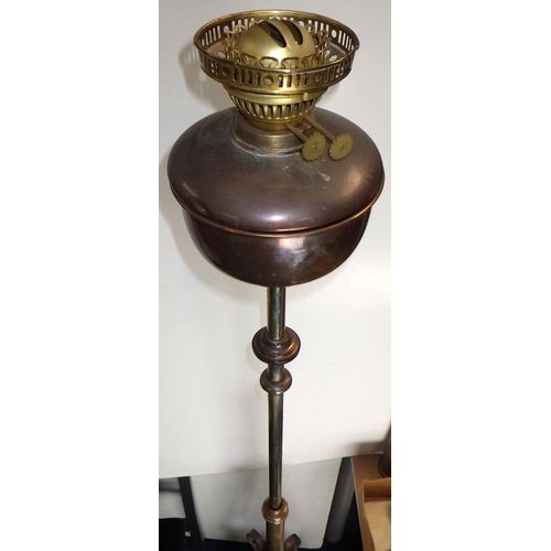 407 - An Arts and Crafts copper and brass adjustable standard oil lamp