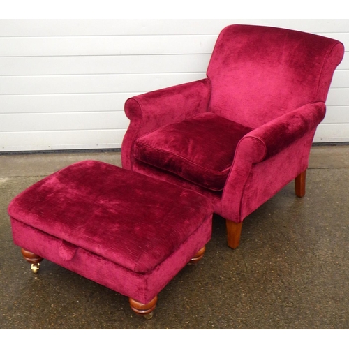 480 - A red upholstered easy chair, together with a footstool, stool with Duresta label (2)