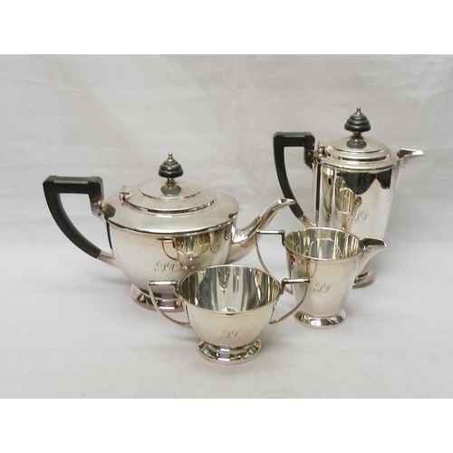 64 - A silver plated Rowntree's presentation Art Deco influence four piece tea set.