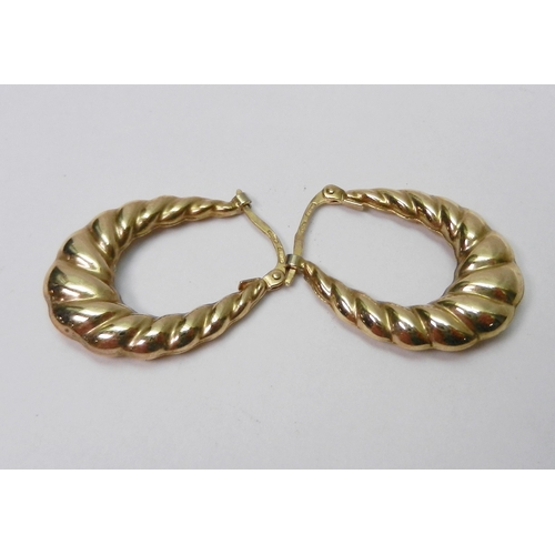 73 - A pair of Italian textured hoop earrings, 9ct gold.  25mm long / 1.5g