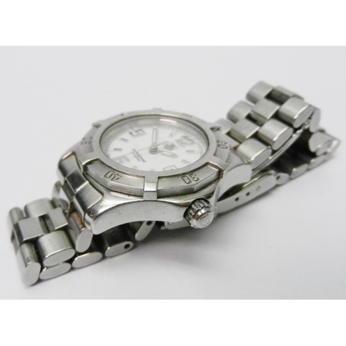 8 - A Tag Heuer Professional bracelet watch c1999, the quartz movement under a white dial in a stainless... 