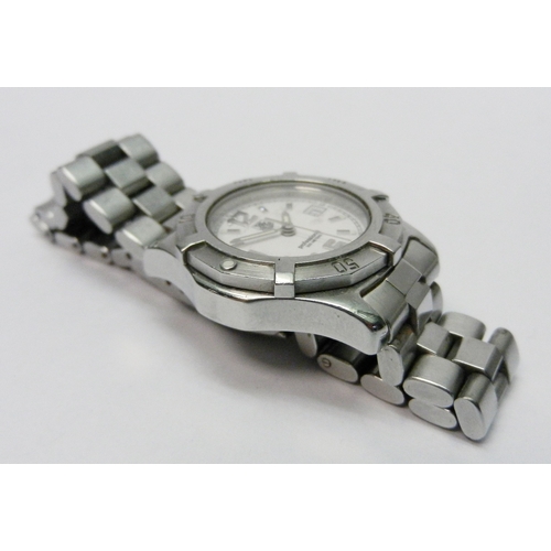 8 - A Tag Heuer Professional bracelet watch c1999, the quartz movement under a white dial in a stainless... 