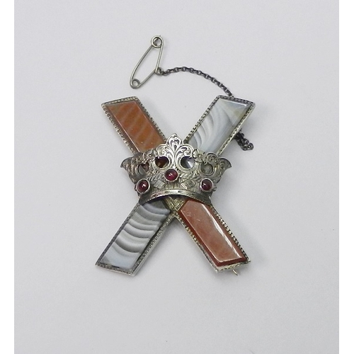 47 - A Scottish brooch, comprising a St Andrews cross with applied crown motif, white metal and agate.  5... 